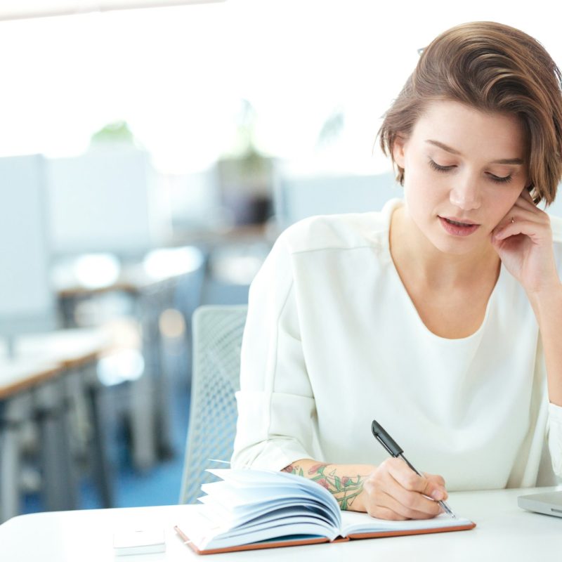 businesswoman-talking-on-the-phone-in-office.jpg